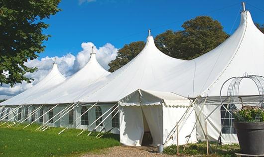 a line of sleek and modern portable toilets ready for use at an upscale corporate event in Lynnfield MA